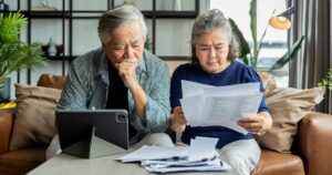 The Lodge at Stephens Lake | senior couple reviewing papers