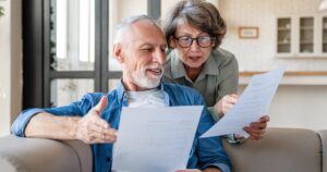 The Lodge at Stephens Lake | senior couple reviewing papers